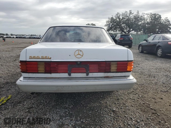 1990 Mercedes-Benz 560 with VIN WDBCA39E8LA536590, listed as a Copart auction lot 76843244 with 231,703 mi miles and Non Repairable. Bid and sale history available at DreamBid. Image 6.