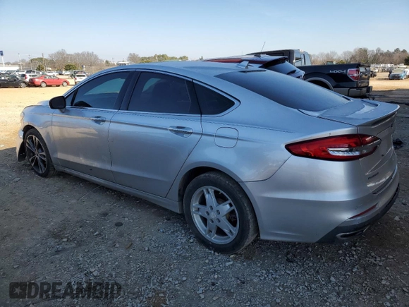 2019 Ford Fusion Titanium with VIN 3FA6P0D92KR141420, listed as a Copart auction lot 88300925 with 138,136 mi miles and Salvage Title. Bid and sale history available at carsss.com. Image 2.