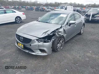 2014 Mazda 6 i Touring with VIN JM1GJ1V64E1147549, listed as a IAAI auction lot 42041025 with 124,400 mi miles and . Bid and sale history available at DreamBid. Image 17.