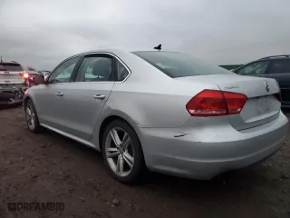 2014 Volkswagen Passat SE w/Sunroof with VIN 1VWBS7A33EC051984, listed as a Copart auction lot 85201944 with 89,312 mi miles and Salvage Title. Bid and sale history available at carsss.com. Image 2.