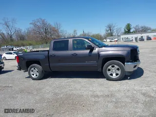 2015 Chevrolet Silverado 1500 LT with VIN 3GCUKREC8FG510992, listed as a IAAI auction lot 41966354 with 176,347 mi miles. Bid and sale history available at carsss.com. Image 14.