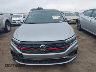 2019 Volkswagen Jetta GLI S z VIN 3VW5T7BU4KM165083, wystawiony jako IAAI lot #40729763 z przebiegiem 75 414 mil mil oraz . Historia ofert i sprzedaży dostępna na DreamBid. Obrazek 12.