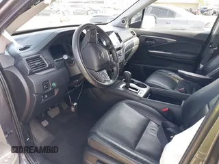 2020 Honda Pilot EX-L z VIN 5FNYF6H50LB047202, wystawiony jako IAAI lot #42117776 z przebiegiem 119 726 mil mil oraz . Historia ofert i sprzedaży dostępna na DreamBid. Obrazek 5.