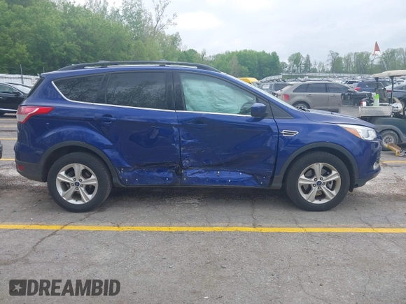 2014 Ford Escape SE z VIN 1FMCU9G94EUD88632, wystawiony jako IAAI lot #42257383 z przebiegiem 150 934 mil mil oraz . Historia ofert i sprzedaży dostępna na DreamBid. Obrazek 13.