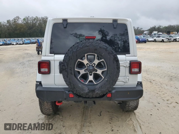 2022 Jeep Wrangler Unlimited Rubicon with VIN 1C4HJXFNXNW133624, listed as a Copart auction lot 48222615 with 51,849 mi miles and Salvage title. Bid and sale history available at DreamBid. Image 6.