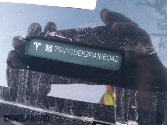 2023 Tesla Model Y Long Range z VIN 7SAYGDEE2PA166042, wystawiony jako IAAI lot #41348960 z przebiegiem Nie podano mil oraz . Historia ofert i sprzedaży dostępna na DreamBid. Obrazek 9.