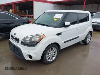 2012 Kia Soul + with VIN KNDJT2A69C7441065, listed as a IAAI auction lot 41821091 with 197,441 mi miles. Bid and sale history available at carsss.com. Image 2.