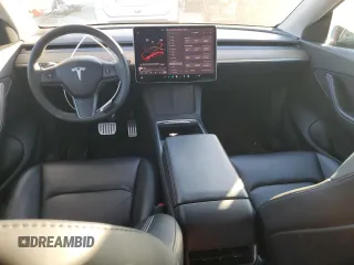 2022 Tesla Model Y Performance with VIN 7SAYGDEF2NF323142, listed as a Copart auction lot 48218235 with 43,524 mi miles and Salvage Title. Bid and sale history available at DreamBid. Image 8.