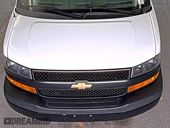2021 Chevrolet Express Cargo z VIN 1GCWGAFP5M1201537, wystawiony jako IAAI lot #42642579 z przebiegiem 96 732 mil mil oraz . Historia ofert i sprzedaży dostępna na DreamBid. Obrazek 41.