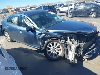 2016 Mazda 6 i Sport with VIN JM1GJ1U57G1451597, listed as a IAAI auction lot 41658184 with 142,504 mi miles and . Bid and sale history available at DreamBid. Image 1.