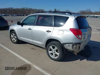 2006 Toyota RAV4 with VIN JTMBK33VX66000704, listed as a IAAI auction lot 41884109 with 256,711 mi miles. Bid and sale history available at carsss.com. Image 3.