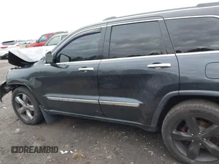 2012 Jeep Grand Cherokee Overland with VIN 1C4RJECT7CC334116, listed as a IAAI auction lot 40968071 with 98,794 mi miles. Bid and sale history available at carsss.com. Image 14.