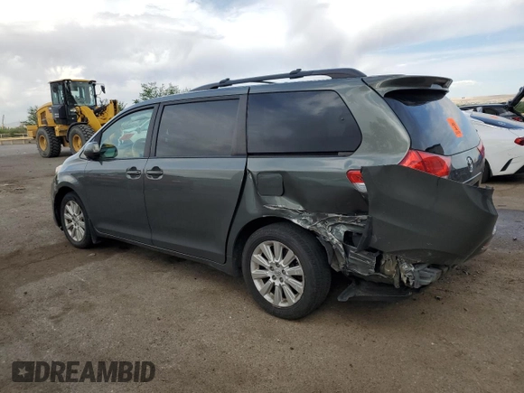 2014 Toyota Sienna LE with VIN 5TDJK3DC4ES085384, listed as a Copart auction lot 60375125 with 81,696 mi miles and Salvage title. Bid and sale history available at DreamBid. Image 2.