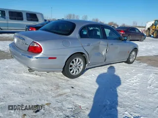 2001 Jaguar S-Type with VIN SAJDA01P11GM20659, listed as a IAAI auction lot 41330249 with 146,309 mi miles and . Bid and sale history available at DreamBid. Image 4.