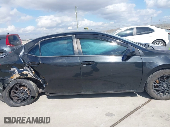 2015 Toyota Corolla L with VIN 5YFBURHE3FP307047, listed as a IAAI auction lot 41525250 with 181,605 mi miles and . Bid and sale history available at DreamBid. Image 13.