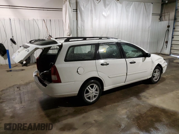 2001 Ford Focus SE with VIN 1FAFP36311W361122, listed as a Copart auction lot 81528684 with 140,431 mi miles and Salvage Title. Bid and sale history available at carsss.com. Image 3.