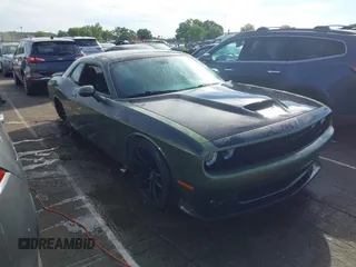 2021 Dodge Challenger R/T Scat Pack z VIN 2C3CDZFJ5MH610147, wystawiony jako IAAI lot #42322694 z przebiegiem 27 509 mil mil oraz . Historia ofert i sprzedaży dostępna na DreamBid. Obrazek 1.