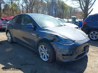 2023 Tesla Model Y Long Range with VIN 7SAYGDEEXPA175104, listed as a IAAI auction lot 41821928 with 52,791 mi miles. Bid and sale history available at carsss.com. Image 6.