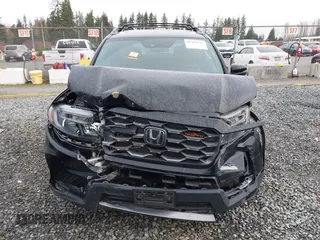 2022 Honda Passport TrailSport z VIN 5FNYF8H63NB001094, wystawiony jako IAAI lot #41765935 z przebiegiem 44 366 mil mil oraz . Historia ofert i sprzedaży dostępna na DreamBid. Obrazek 12.