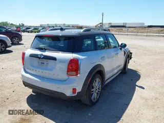 2018 MINI Countryman Cooper with VIN WMZYV5C37J3E03421, listed as a IAAI auction lot 42238016 with 93,810 mi miles and . Bid and sale history available at DreamBid. Image 4.