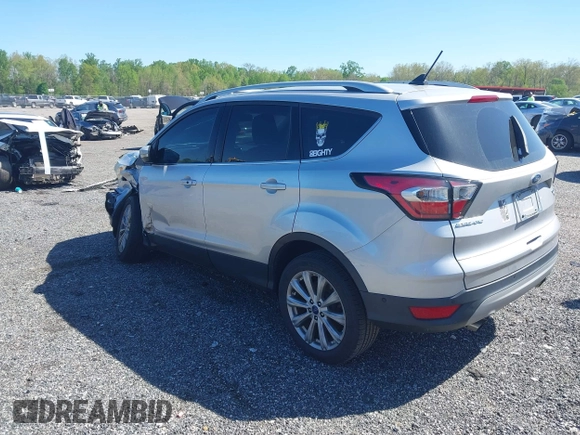 2018 Ford Escape Titanium with VIN 1FMCU9J96JUA33500, listed as a IAAI auction lot 42121736 with 105,430 mi miles and . Bid and sale history available at DreamBid. Image 3.