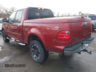 2003 Ford F-150 XLT with VIN 1FTRW08L33KC93082, listed as a IAAI auction lot 41157260 with 240,481 mi miles. Bid and sale history available at carsss.com. Image 3.