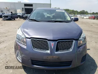 2009 Pontiac Vibe 1SB with VIN 5Y2SP67039Z431857, listed as a Copart auction lot 62357425 with 104,786 mi miles and Salvage title. Bid and sale history available at DreamBid. Image 5.