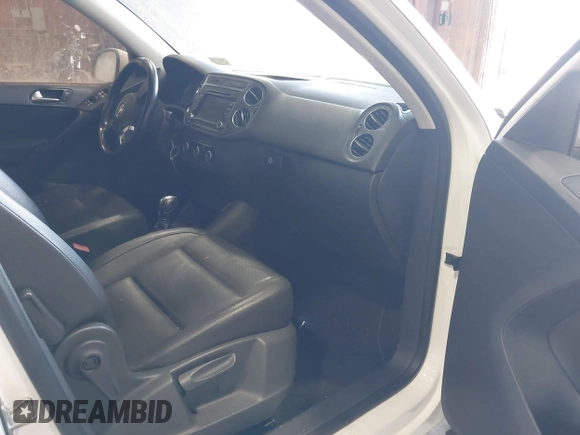 2012 Volkswagen Tiguan SE with VIN WVGAV7AXXCW533237, listed as a IAAI auction lot 42670923 with 227,323 mi miles and . Bid and sale history available at DreamBid. Image 5.