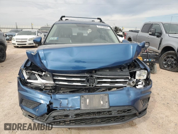 2019 Volkswagen Tiguan with VIN 3VVHP65N3KM053878, listed as a Copart auction lot 71412654 with 68,189 mi miles and Salvage title. Bid and sale history available at DreamBid. Image 5.