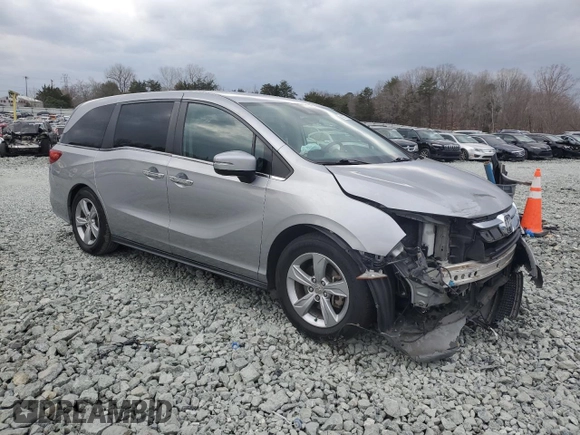 2019 Honda Odyssey EX-L with VIN 5FNRL6H72KB036411, listed as a Copart auction lot 43277355 with 76,244 mi miles and Salvage Title. Bid and sale history available at DreamBid. Image 4.