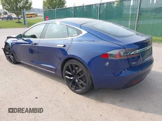 2017 Tesla Model S 100D with VIN 5YJSA1E27HF192505, listed as a IAAI auction lot 42409365 with 111,881 mi miles and . Bid and sale history available at DreamBid. Image 3.