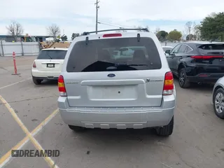 2005 Ford Escape Hybrid with VIN 1FMCU95H05KC95225, listed as a IAAI auction lot 41798610 with 216,659 mi miles and . Bid and sale history available at DreamBid. Image 16.