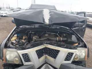 2011 Nissan Xterra Pro-4X with VIN 5N1AN0NW1BC506369, listed as a IAAI auction lot 41802083 with 133,107 mi miles. Bid and sale history available at carsss.com. Image 10.