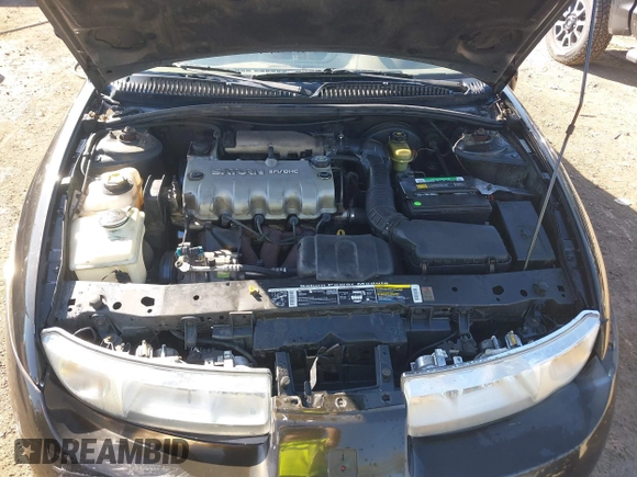 1997 Saturn SC z VIN 1G8ZE1283VZ163658, wystawiony jako IAAI lot #40494467 z przebiegiem 111 701 mil mil oraz . Historia ofert i sprzedaży dostępna na DreamBid. Obrazek 10.