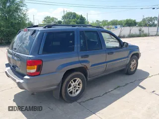 2002 Jeep Grand Cherokee Laredo with VIN 1J4GW48SX2C206755, listed as a IAAI auction lot 42631502 with 155,752 mi miles and . Bid and sale history available at DreamBid. Image 4.