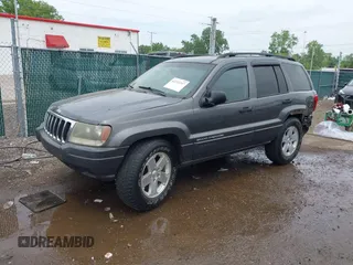 2003 Jeep Grand Cherokee Laredo z VIN 1J4GW48S73C545863, wystawiony jako IAAI lot #42222247 z przebiegiem 128 529 mil mil oraz . Historia ofert i sprzedaży dostępna na DreamBid. Obrazek 2.
