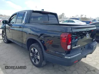 2020 Honda Ridgeline RTL with VIN 5FPYK3F53LB030107, listed as a IAAI auction lot 41933517 with 93,373 mi miles and . Bid and sale history available at DreamBid. Image 3.