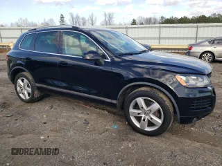 2012 Volkswagen Touareg Lux z VIN WVGEK9BP4CD008562, wystawiony jako Copart lot #47947675 z przebiegiem 136 048 mil mil oraz Szkoda całkowita • Salvage title. Historia ofert i sprzedaży dostępna na DreamBid. Obrazek 4.