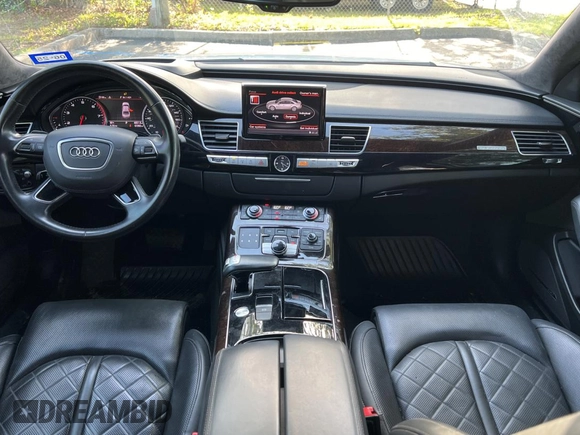 2017 Audi A8 Sport z VIN WAU43AFD7HN005619, wystawiony jako Copart lot #57526015 z przebiegiem 57 262 mil mil oraz Szkoda całkowita • Salvage title. Historia ofert i sprzedaży dostępna na DreamBid. Obrazek 9.