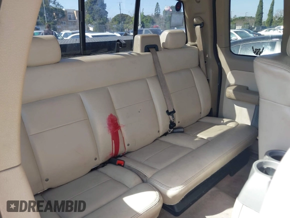 2004 Ford F-150 XL with VIN 1FTPX125X4NB03038, listed as a IAAI auction lot 41555454 with 218,770 mi miles. Bid and sale history available at carsss.com. Image 8.