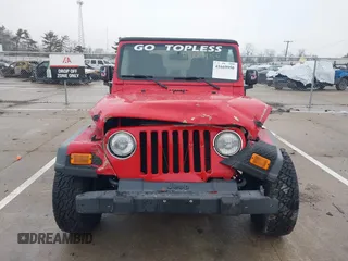 2006 Jeep Wrangler SE with VIN 1J4FA29156P762295, listed as a IAAI auction lot 41669950 with 163,492 mi miles and . Bid and sale history available at DreamBid. Image 6.