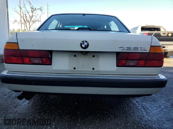 1991 BMW 7 Series z VIN WBAGC4310MDC27706, wystawiony jako Copart lot #81496754 z przebiegiem Nie podano mil oraz Nie do naprawy • Non repairable. Historia ofert i sprzedaży dostępna na DreamBid. Obrazek 6.