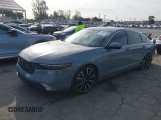 2023 Honda Accord Touring with VIN 1HGCY2F81PA035053, listed as a IAAI auction lot 41807628 with 57,422 mi miles and . Bid and sale history available at DreamBid. Image 2.