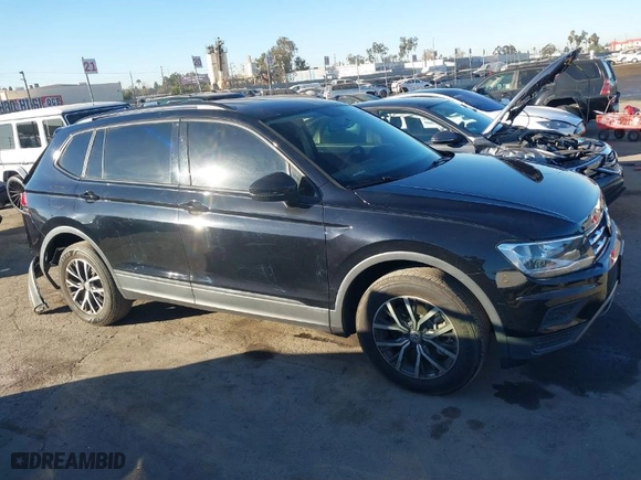 2021 Volkswagen Tiguan S with VIN 3VV1B7AX2MM051166, listed as a IAAI auction lot 41233878 with 28,690 mi miles. Bid and sale history available at carsss.com. Image 13.