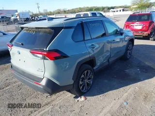 2023 Toyota RAV4 Hybrid XLE Premium with VIN JTMB6RFV3PD116696, listed as a IAAI auction lot 42044933 with 18,553 mi miles. Bid and sale history available at carsss.com. Image 4.