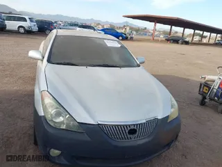 2004 Toyota Camry Solara SE with VIN 4T1CE38P84U800363, listed as a IAAI auction lot 41556614 with 165,032 mi miles. Bid and sale history available at carsss.com. Image 6.