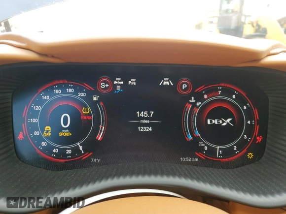 2021 Aston Martin DBX z VIN SCFVUJAW7MTV03341, wystawiony jako Copart lot #71015804 z przebiegiem 12 324 mil mil oraz Szkody całkowita. Historia ofert i sprzedaży dostępna na DreamBid. Obrazek 9.