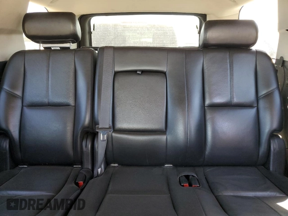 2007 GMC Yukon SLE z VIN 1GKFK13007J260249, wystawiony jako Copart lot #57646525 z przebiegiem 325 491 mil mil oraz Szkoda całkowita • Salvage title. Historia ofert i sprzedaży dostępna na DreamBid. Obrazek 10.