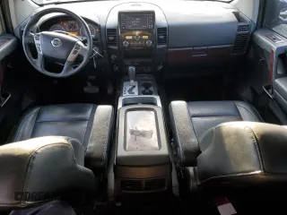 2014 Nissan Titan S with VIN 1N6AA0EC7EN503648, listed as a Copart auction lot 86517824 with 82,556 mi miles and Salvage Title. Bid and sale history available at DreamBid. Image 8.