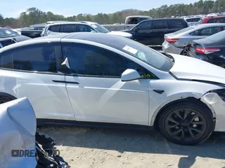 2023 Tesla Model X with VIN 7SAXCDE50PF414198, listed as a IAAI auction lot 41880957 with Not Provided miles and . Bid and sale history available at DreamBid. Image 12.